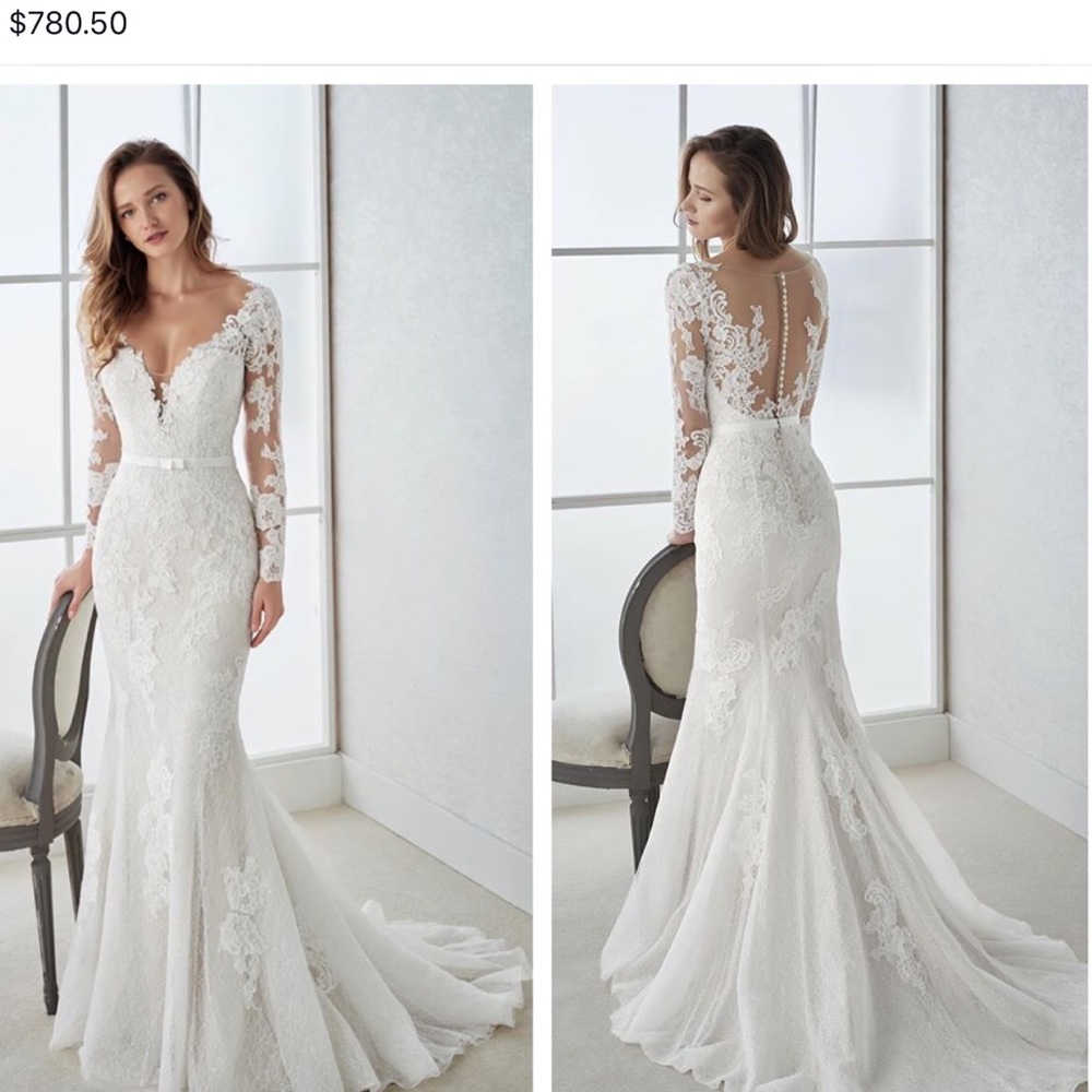 New with Tags, beautiful white one gown.